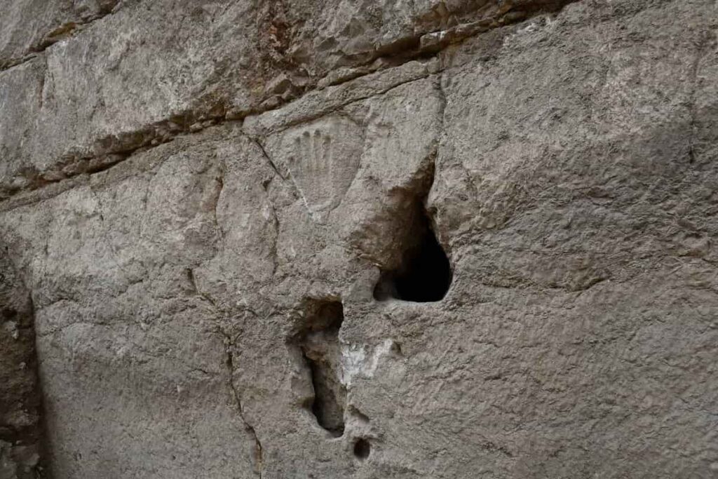 Mysterious Hand Imprint Discovered In 1,000-Year-Old Moat Wall In Jerusalem