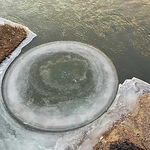 Giant Spinning Ice Disk on a River in China