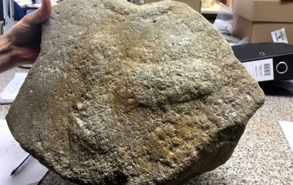 2,000-Year-Old Roman Millstone Found with Massive Phallus Engraving