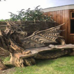 Dragon Bench Carved With a Chainsaw by Artist Igor Loskutow