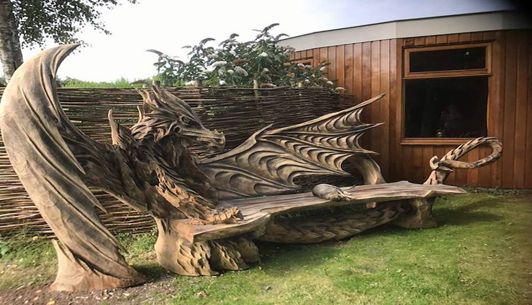 Dragon Bench Carved With a Chainsaw by Artist Igor Loskutow